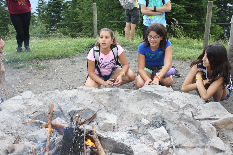 Village Camps International Summer Camp Leysin, Switzerland 2025-08-09 https://www.villagecamps.com/journals_admin/images/691-14-campfire yellows (17).jpg